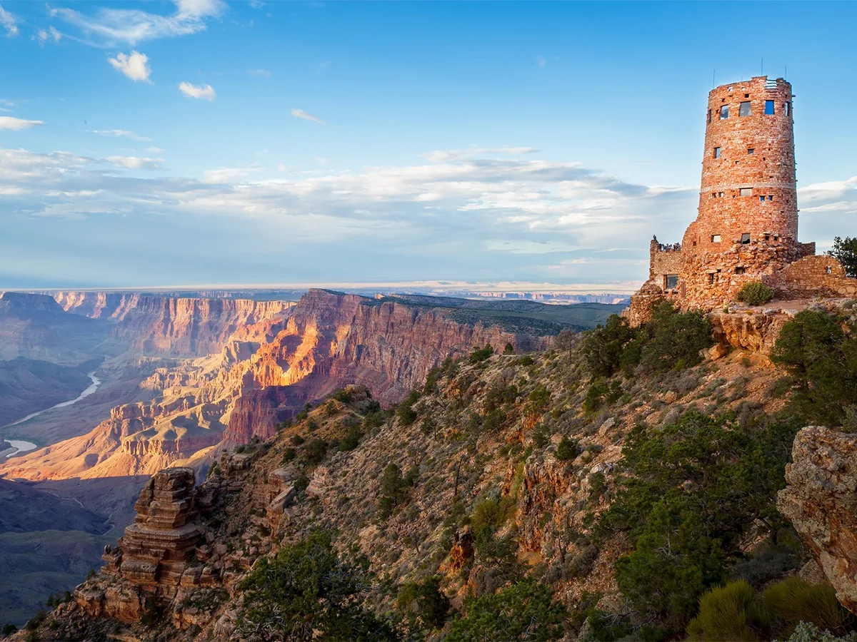 Desert View Watchtower above the Grand Canyon in warm directional light